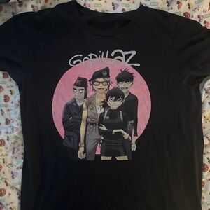 Gorillaz Graphic T‑Shirt in Black with Pink Background.